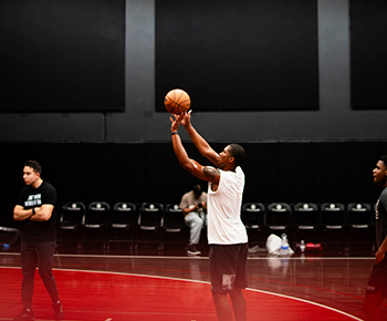Student athlete preparing to throw basketball